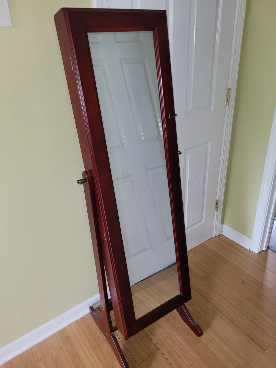 Standing mirror with storage