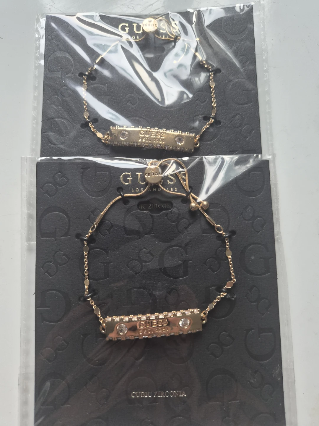 Guess Bracelets with Cubic Zirconia - Gold Tone