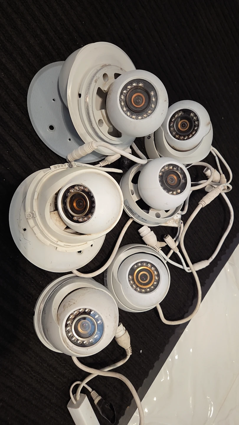 6 white Security Cameras