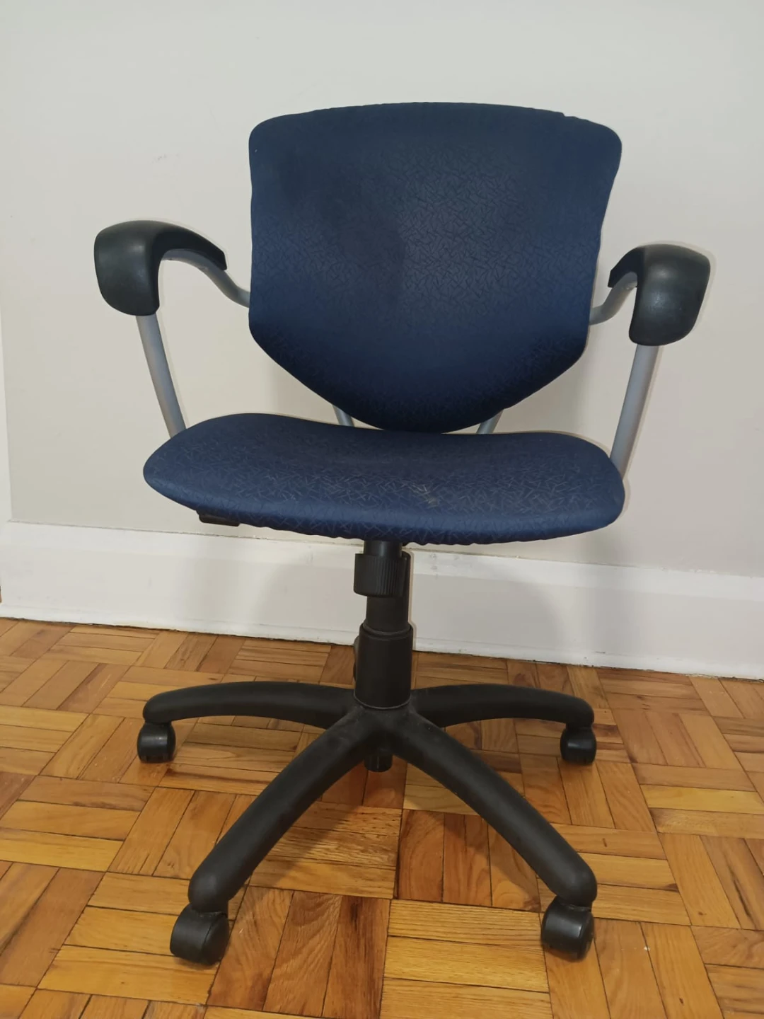 Blue fabric office chair with armrests