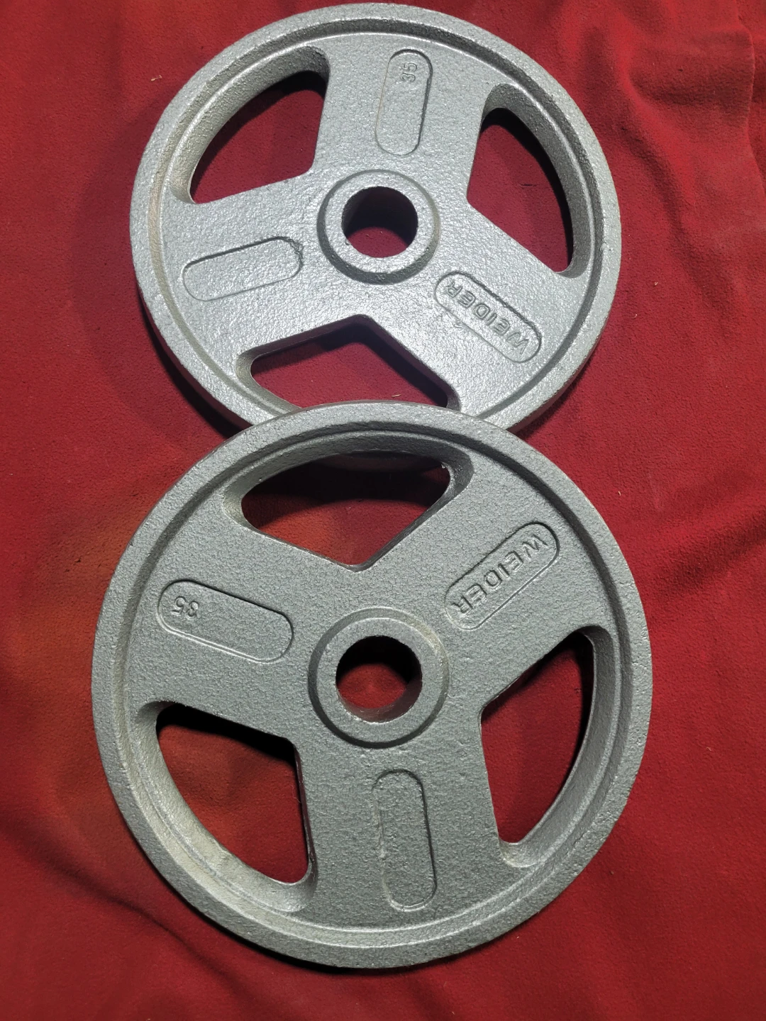 70LBs  2" HOLE OLYMPIC PLATES.  2-35s