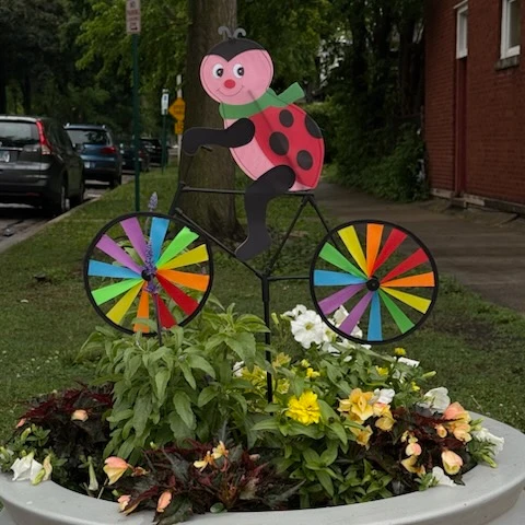 New Whimsical Garden Stake with Character Riding a Bicycle