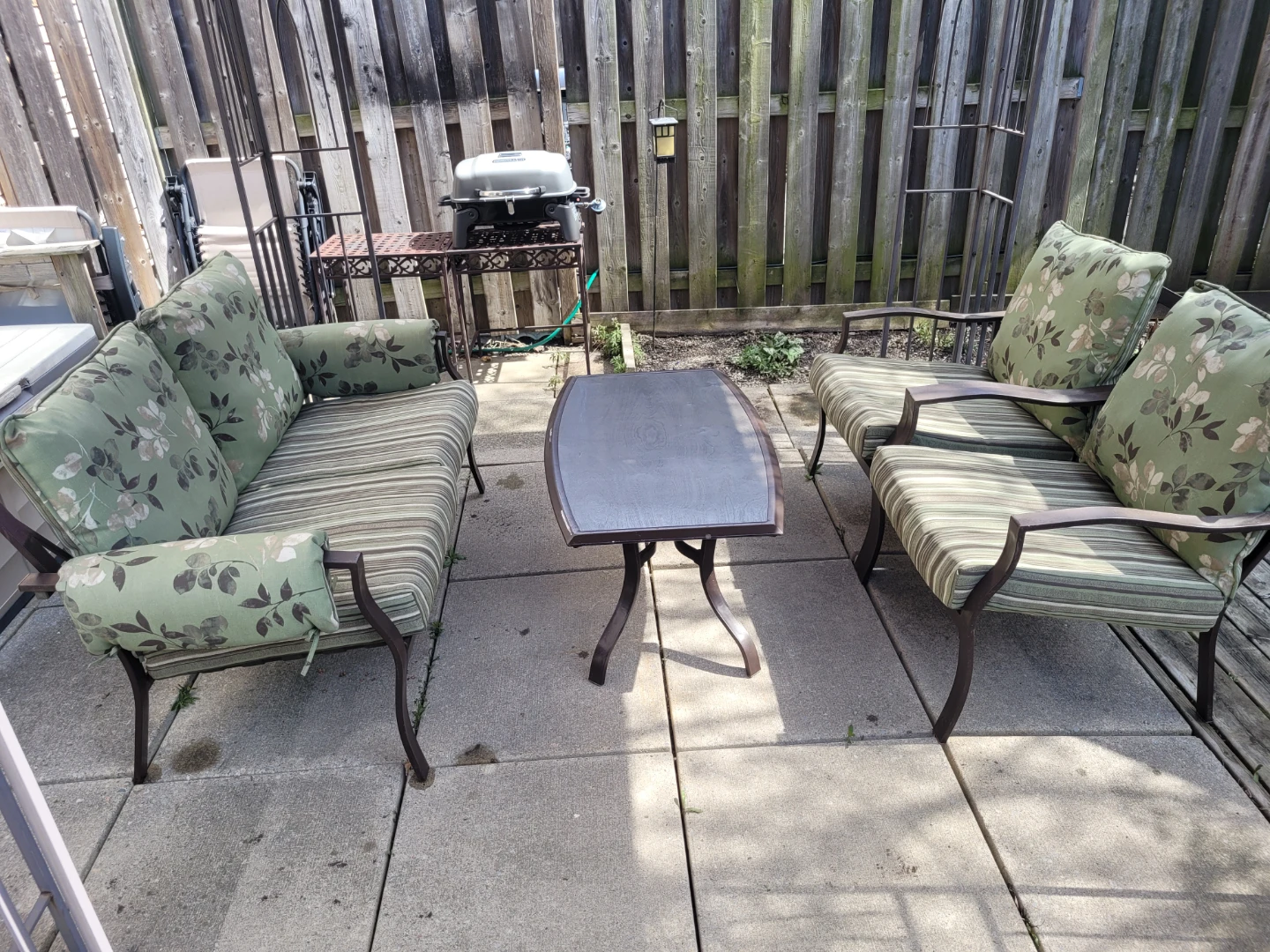 Outdoor patio furniture set with couch and chairs