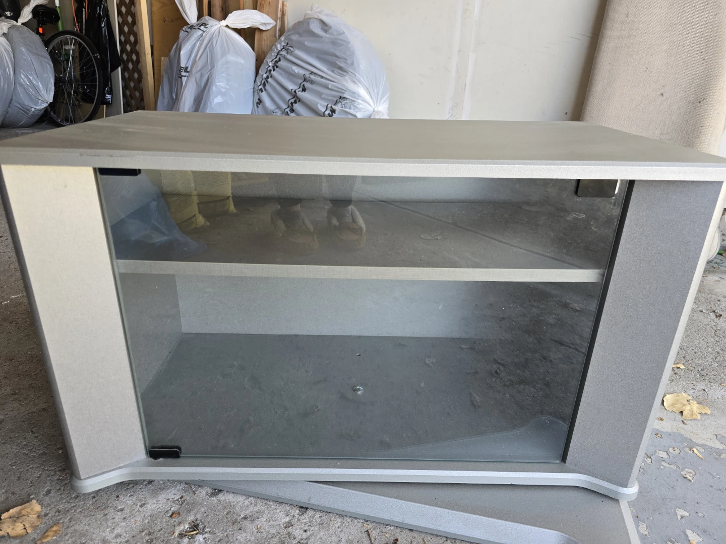 FREE Swivel TV Stand with Glass Door - photo 2