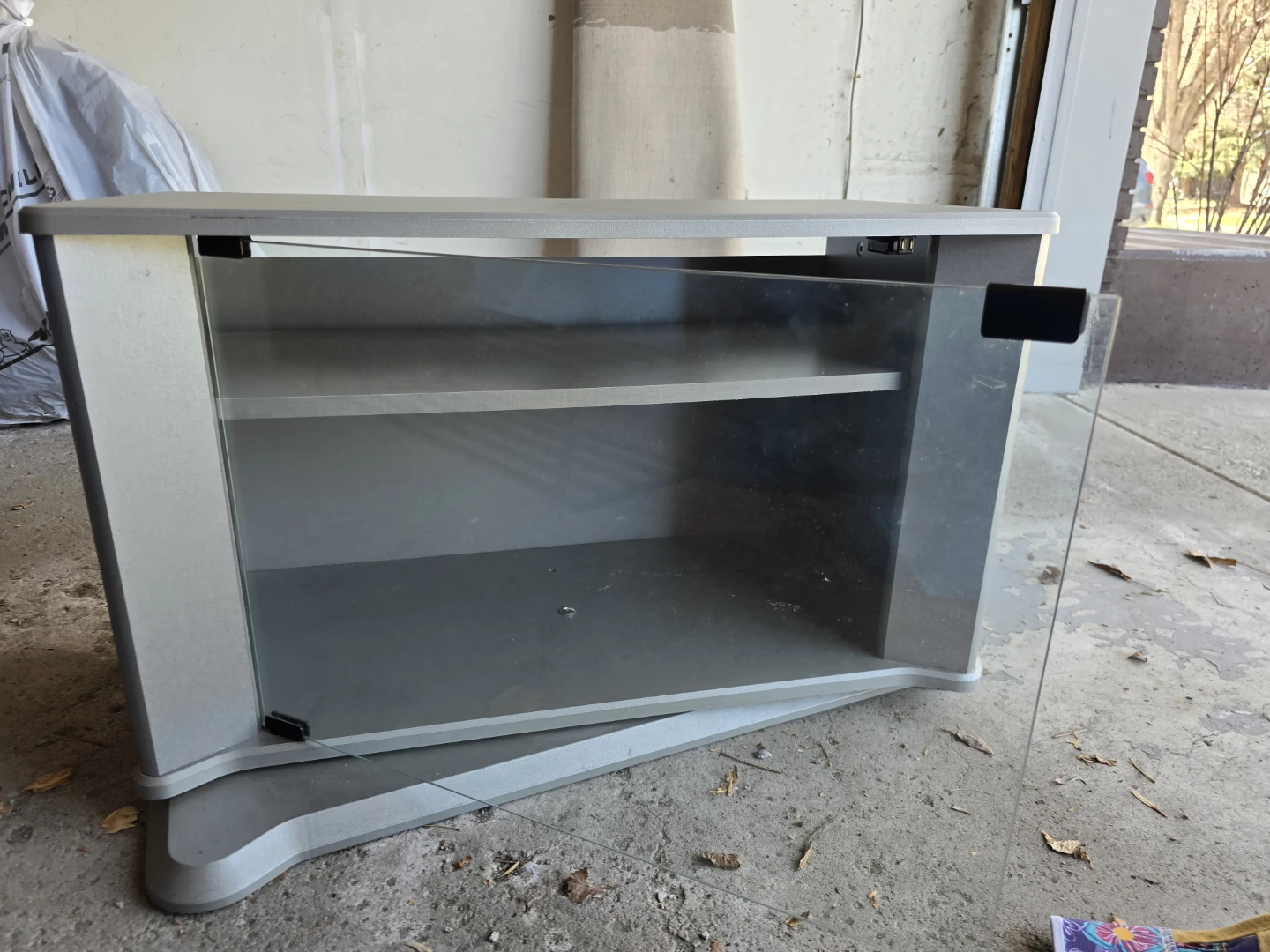 FREE Swivel TV Stand with Glass Door - photo 3