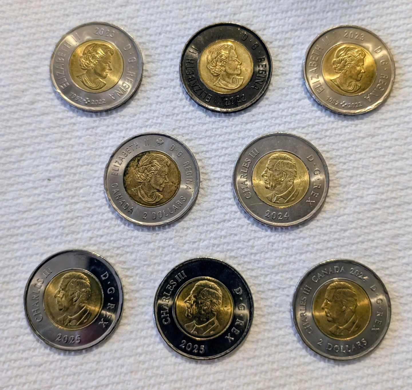 Collection of 8 Canadian $2 Coins - Various Designs - photo 2
