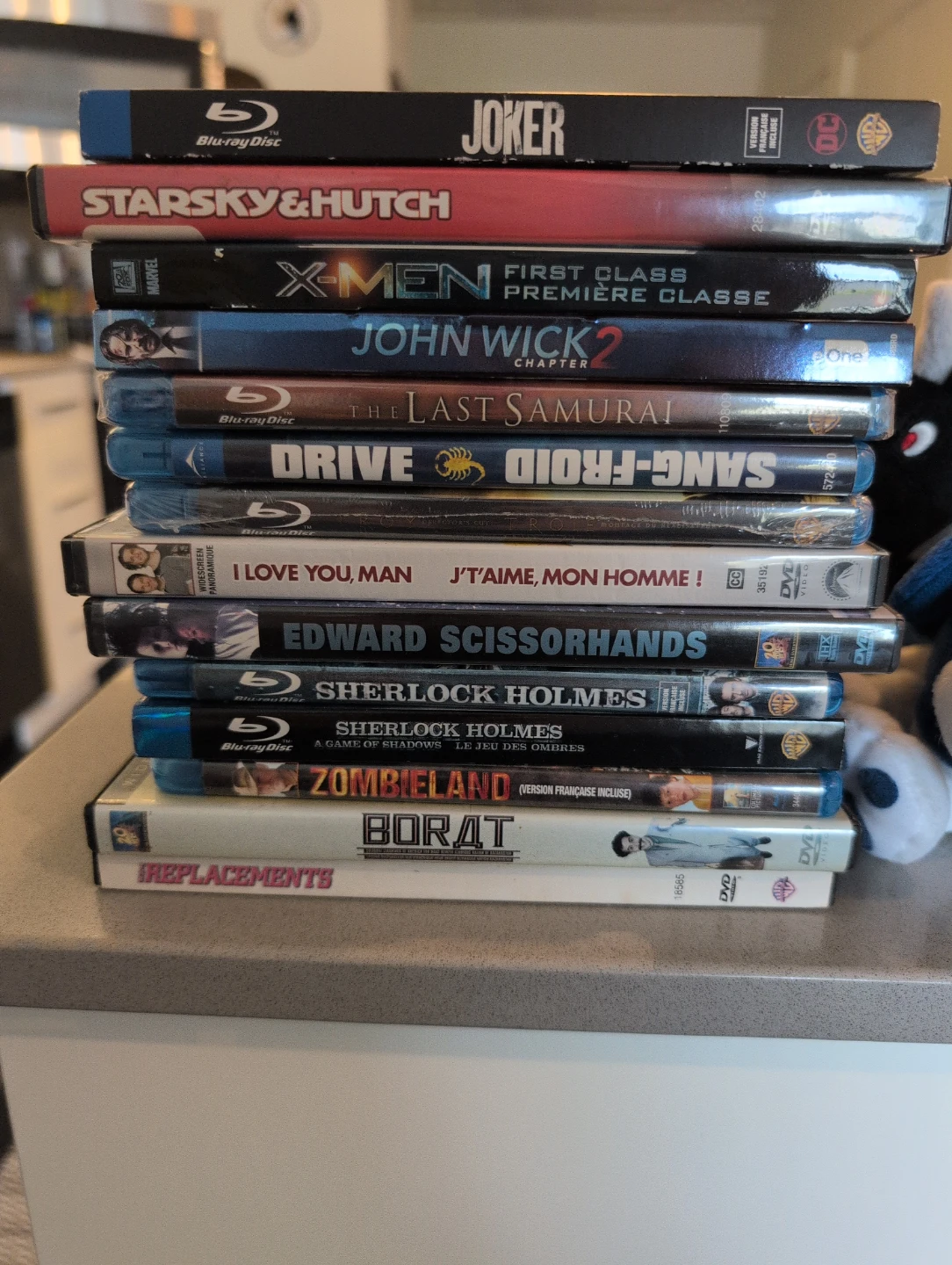 Stack of 11 Blu-ray and DVD Movies