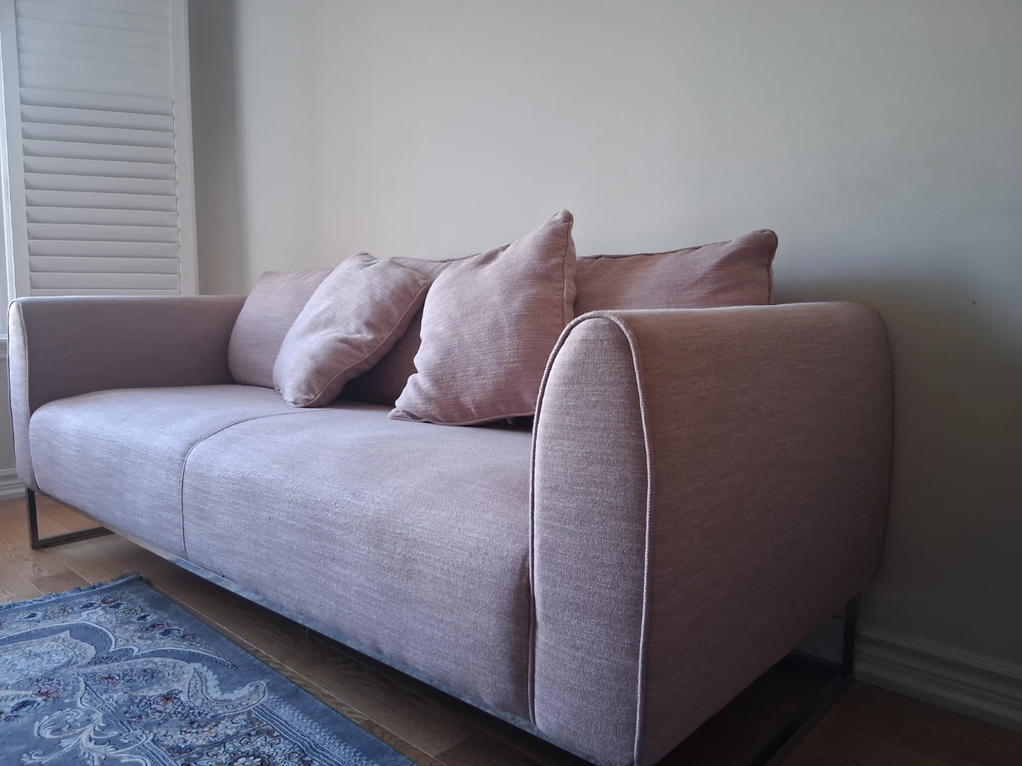 Light Pink Sofa with Pillows