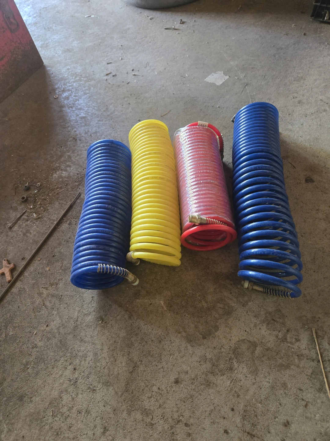 Four Coiled Air Hoses