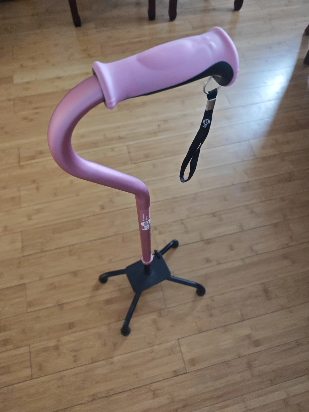 Pink Adjustable Quad Cane with Comfortable Grip