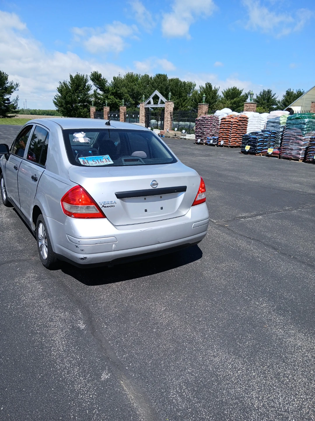 Silver Nissan Versa Sedan - photo 2