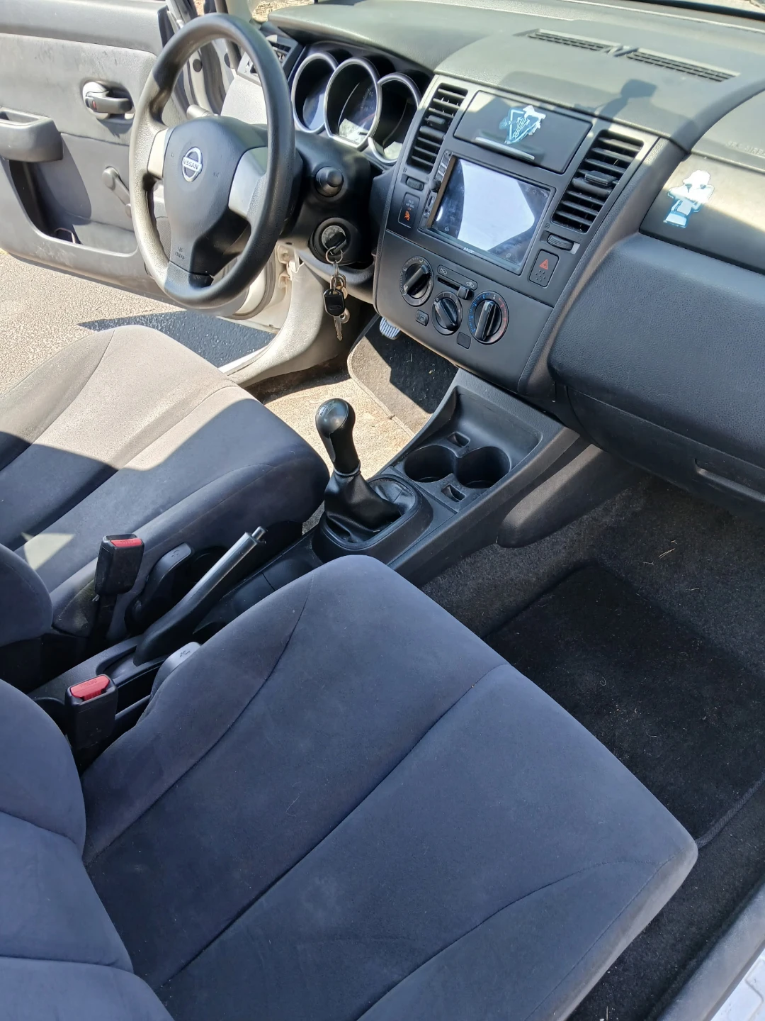 Silver Nissan Versa Sedan - photo 3