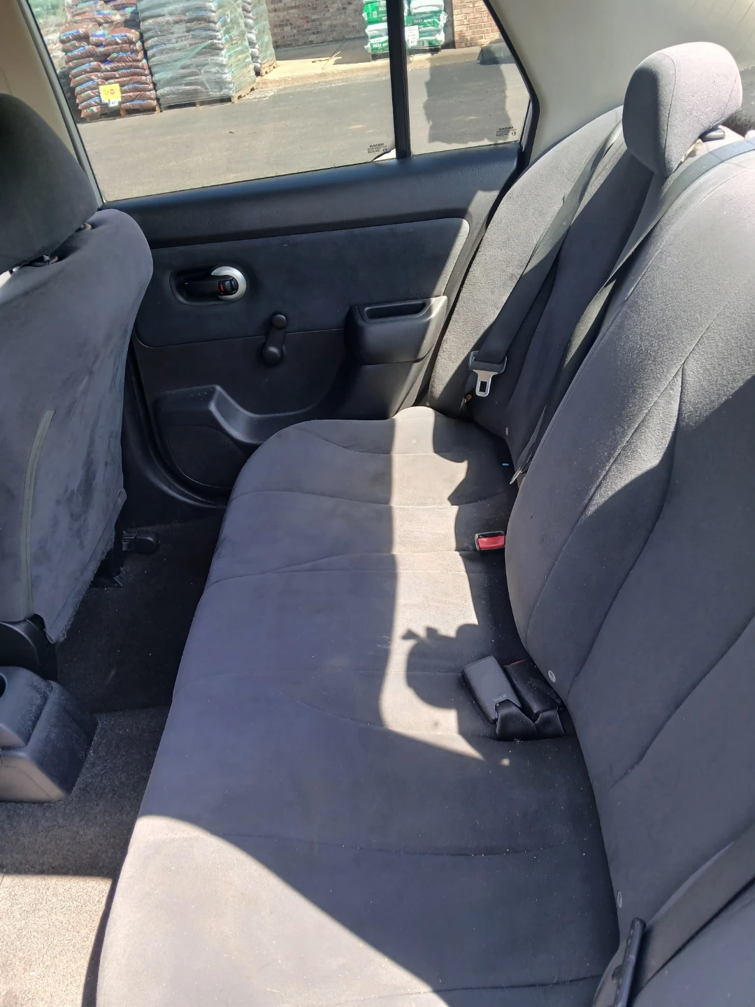 Silver Nissan Versa Sedan - photo 4