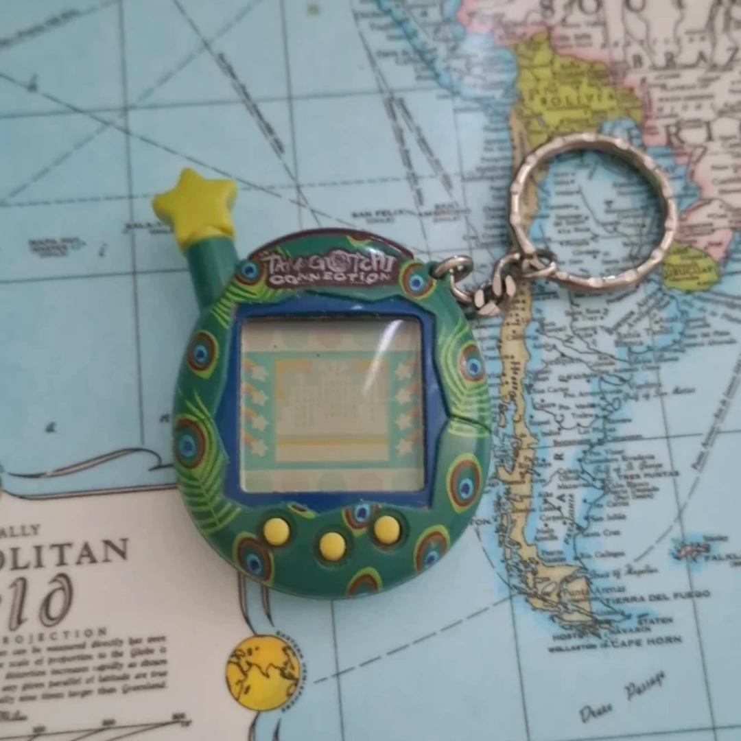 Tamagotchi 2004 Peacock Feathers Bandai Toy