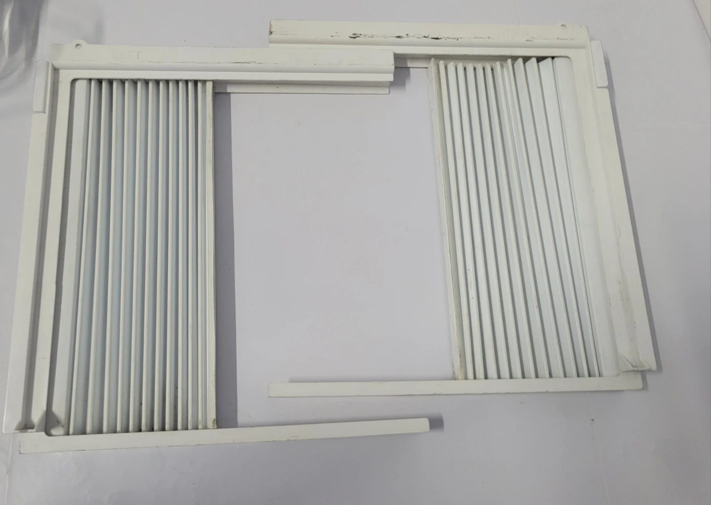 Side panels for a window air conditioner