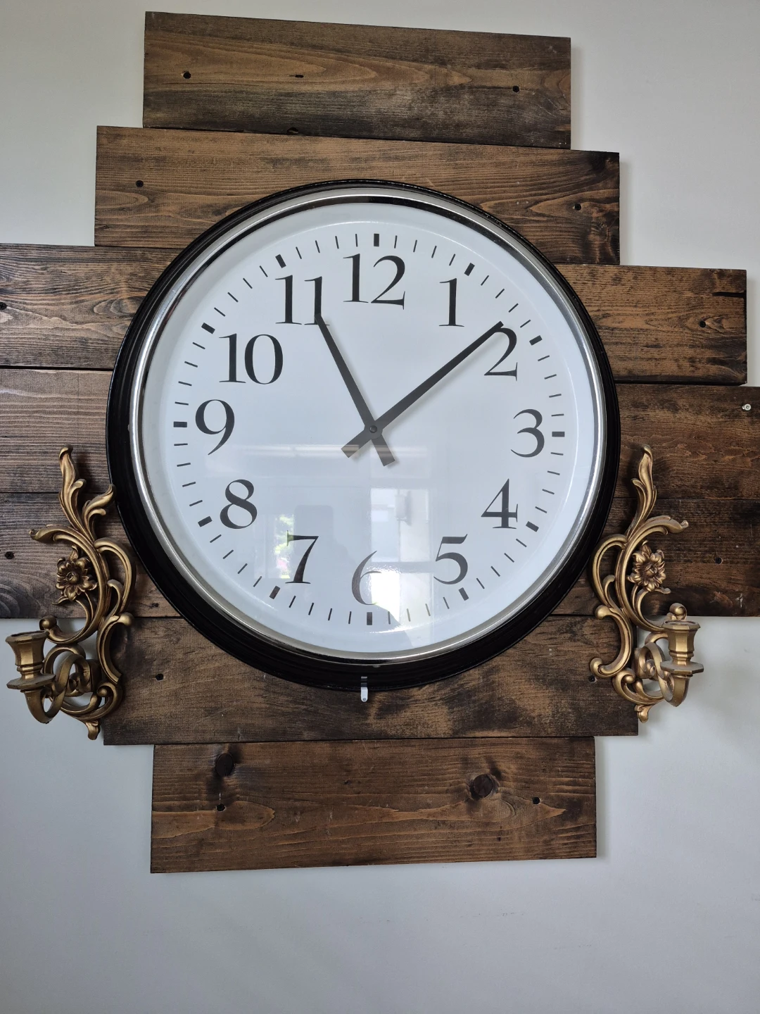 Wall Clock with Decorative Candlesticks