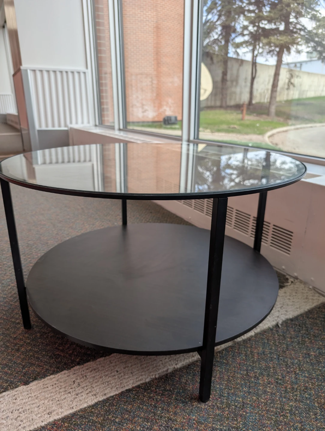 Round Glass Top Coffee Table with Black Metal Frame