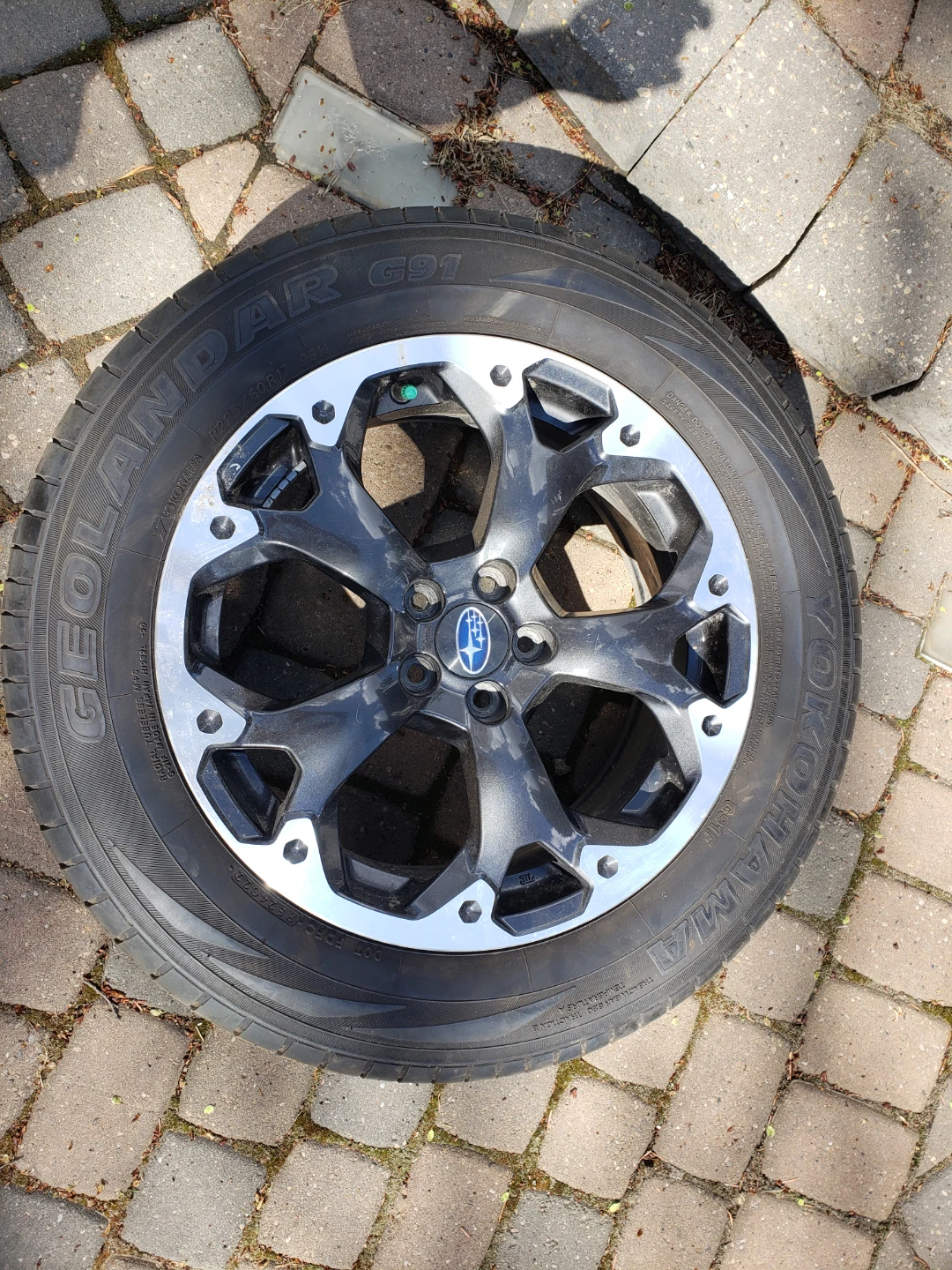 Subaru 2023 stock rims and Yokohama Geolandar set of 4