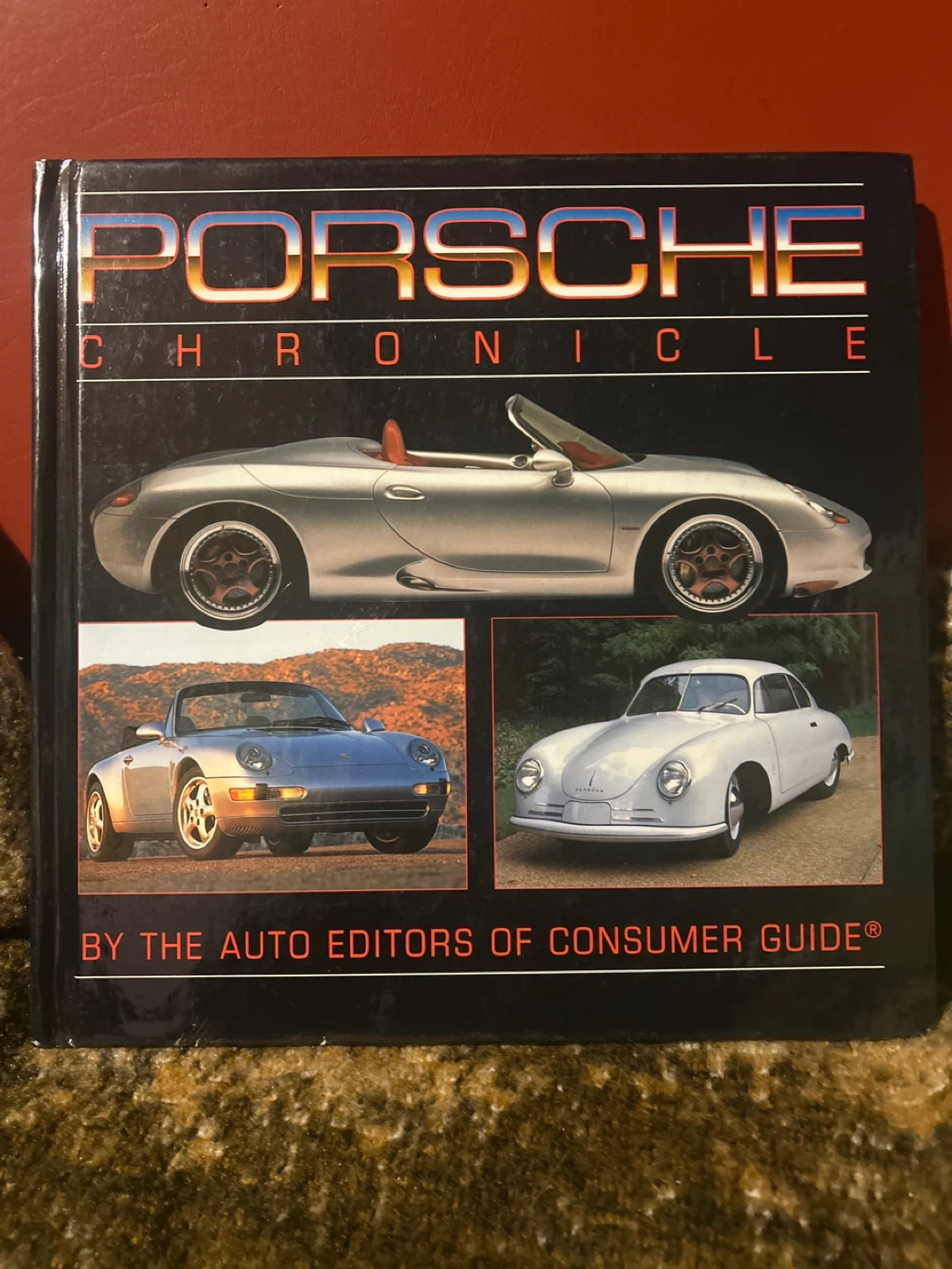 Porsche Chronicle Book by Auto Editors of Consumer Guide