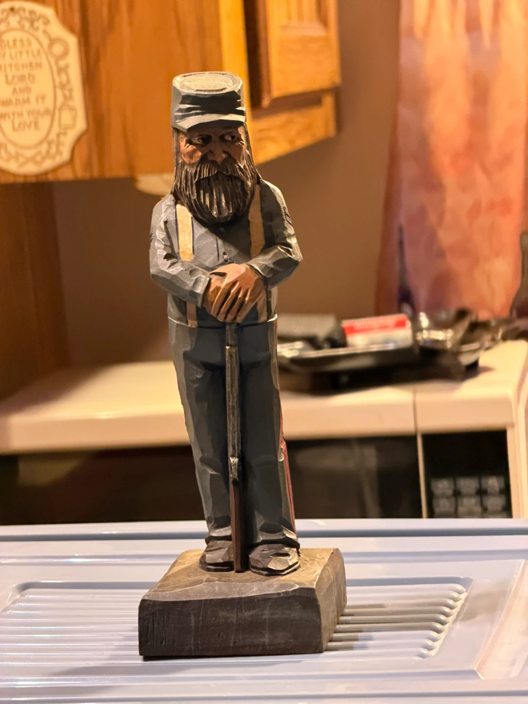 Hand Carved Wooden Figurine of a Man with Rifle