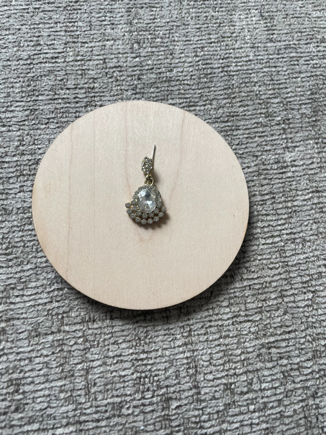 Gold-tone drop earring with clear stones
