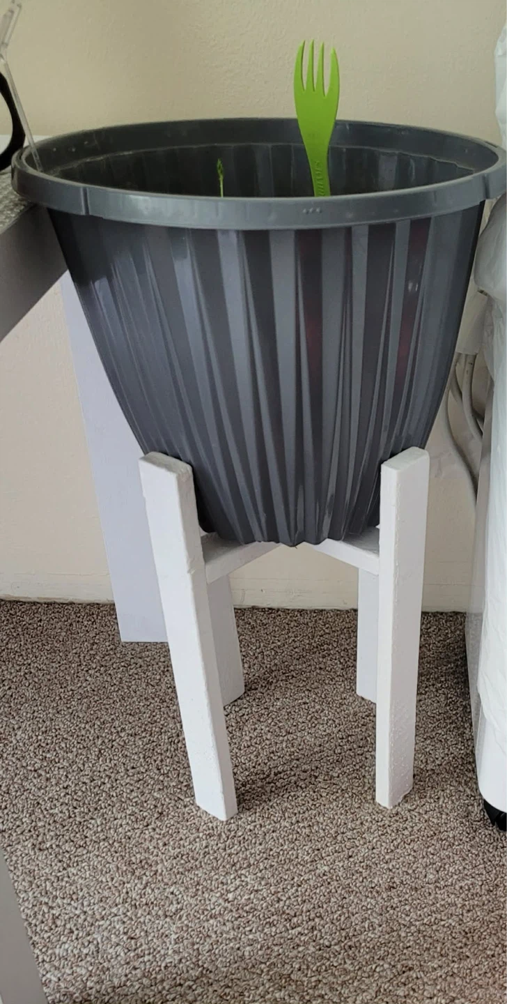 Grey plant pot with stand