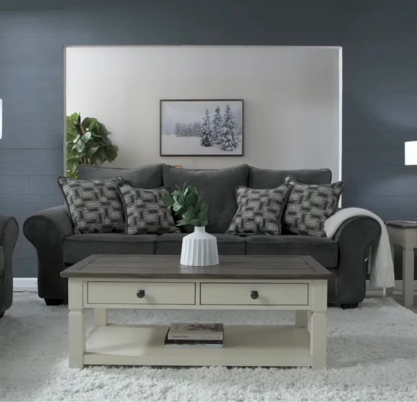 Dark Gray Sofa with Two Decorative Pillows