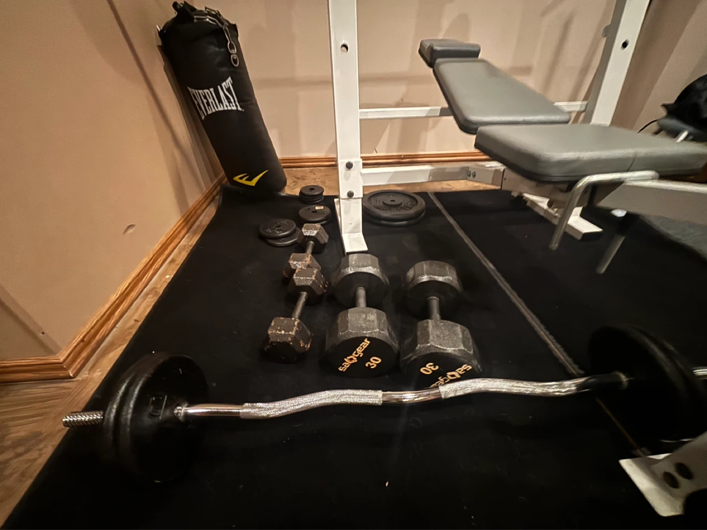 Weight Bench, Dumbbells, Barbell, and Punching Bag Set