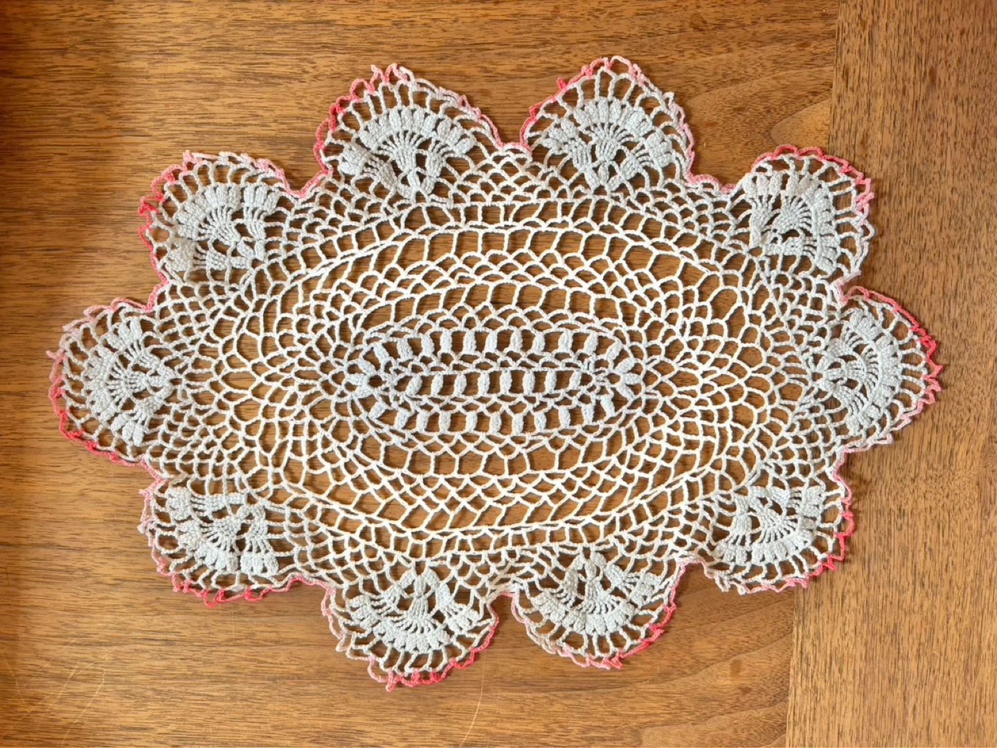 Vintage White crochet doily with pink edging