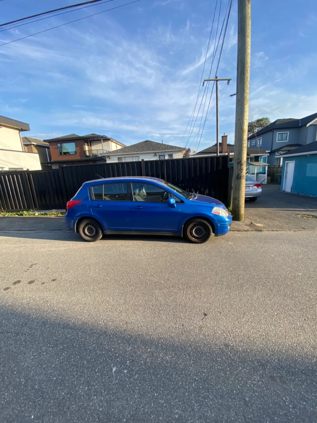 Blue Nissan Versa Hatchback - photo 2