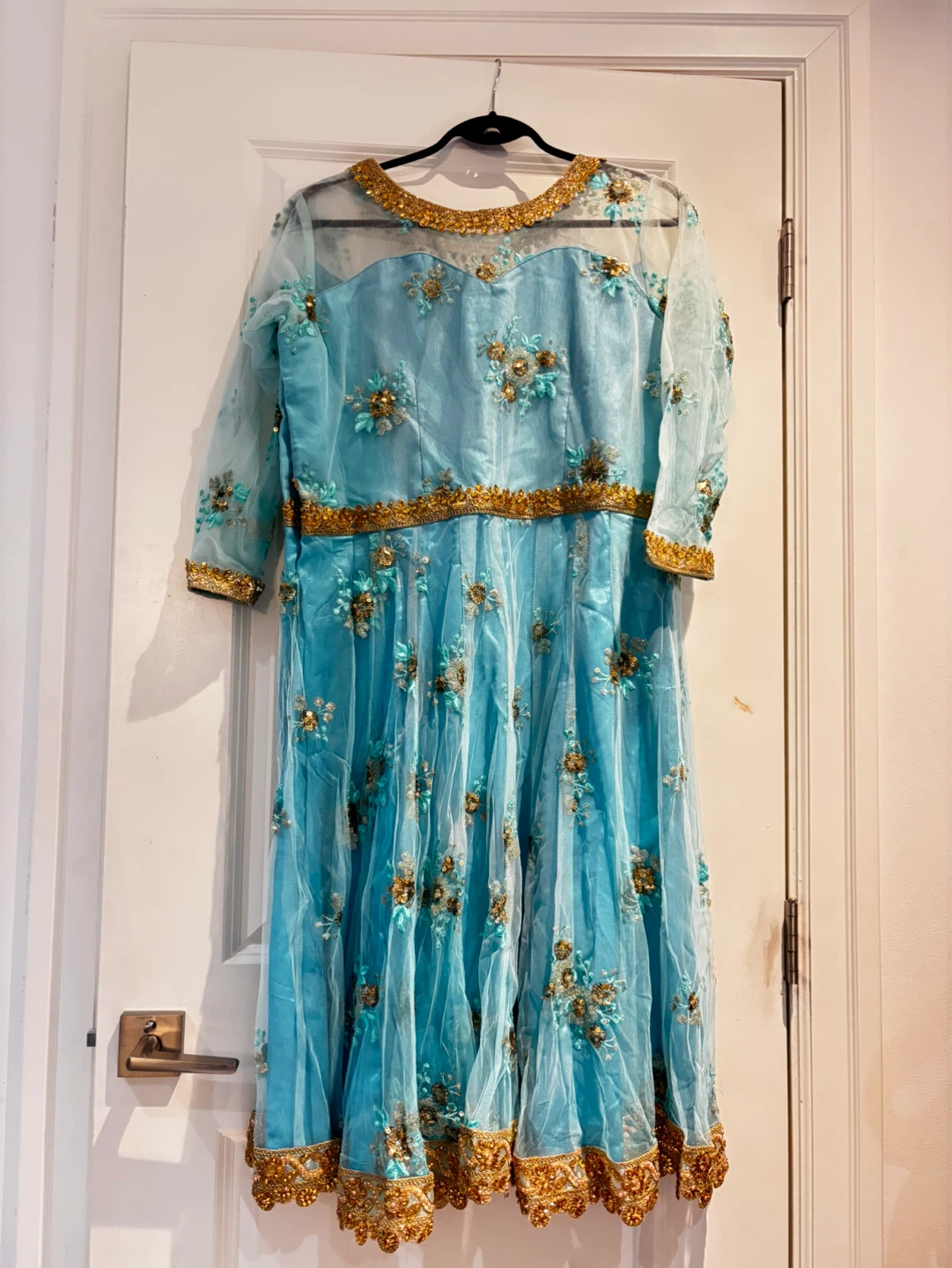 Sky blue embroidered Anarkali dress with gold accents