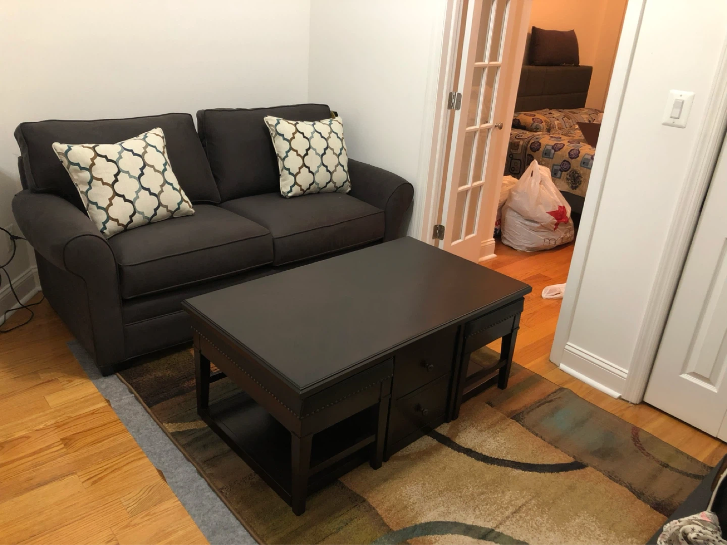 Lift Top Coffee Table with 2 Hidden Ottomans - photo 2