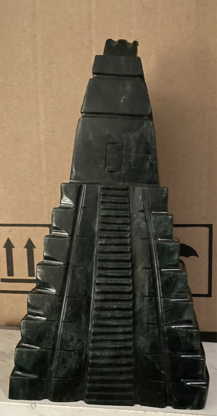 Carved figurine of the Temple of the Great Jaguar made of stone
