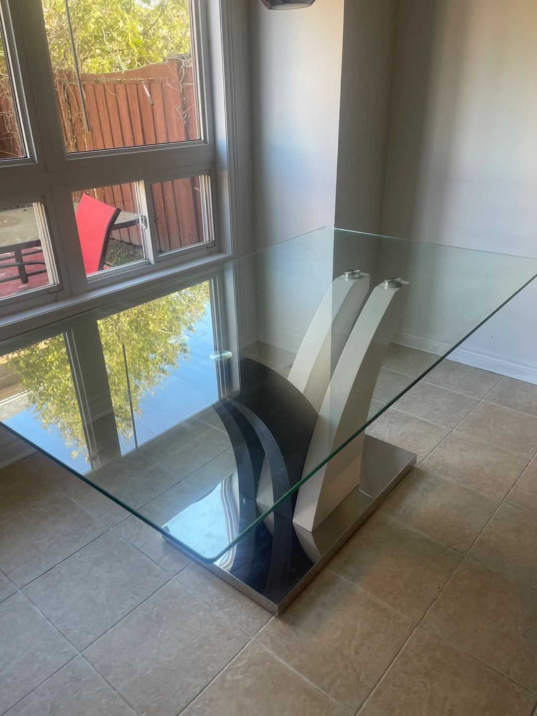 Glass Dining Table with Modern Base