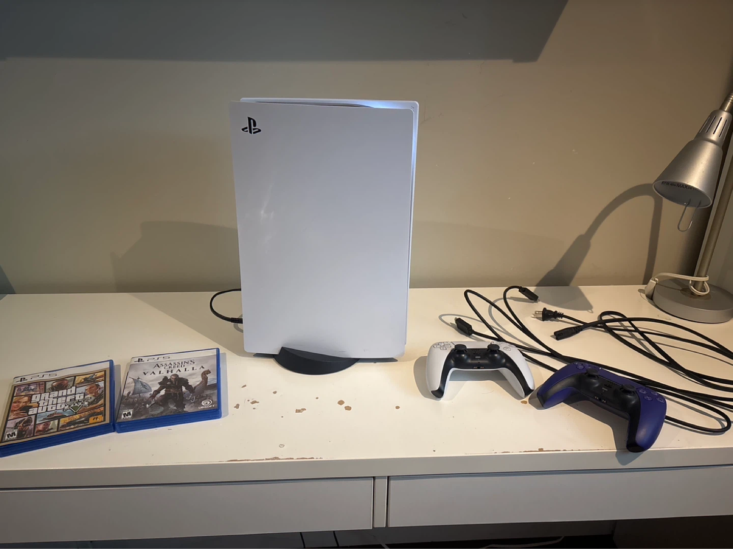 Sony PlayStation 5 with 2 controllers and 2 games
