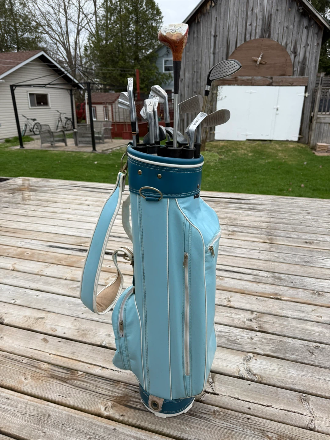 Spalding golf bag and clubs