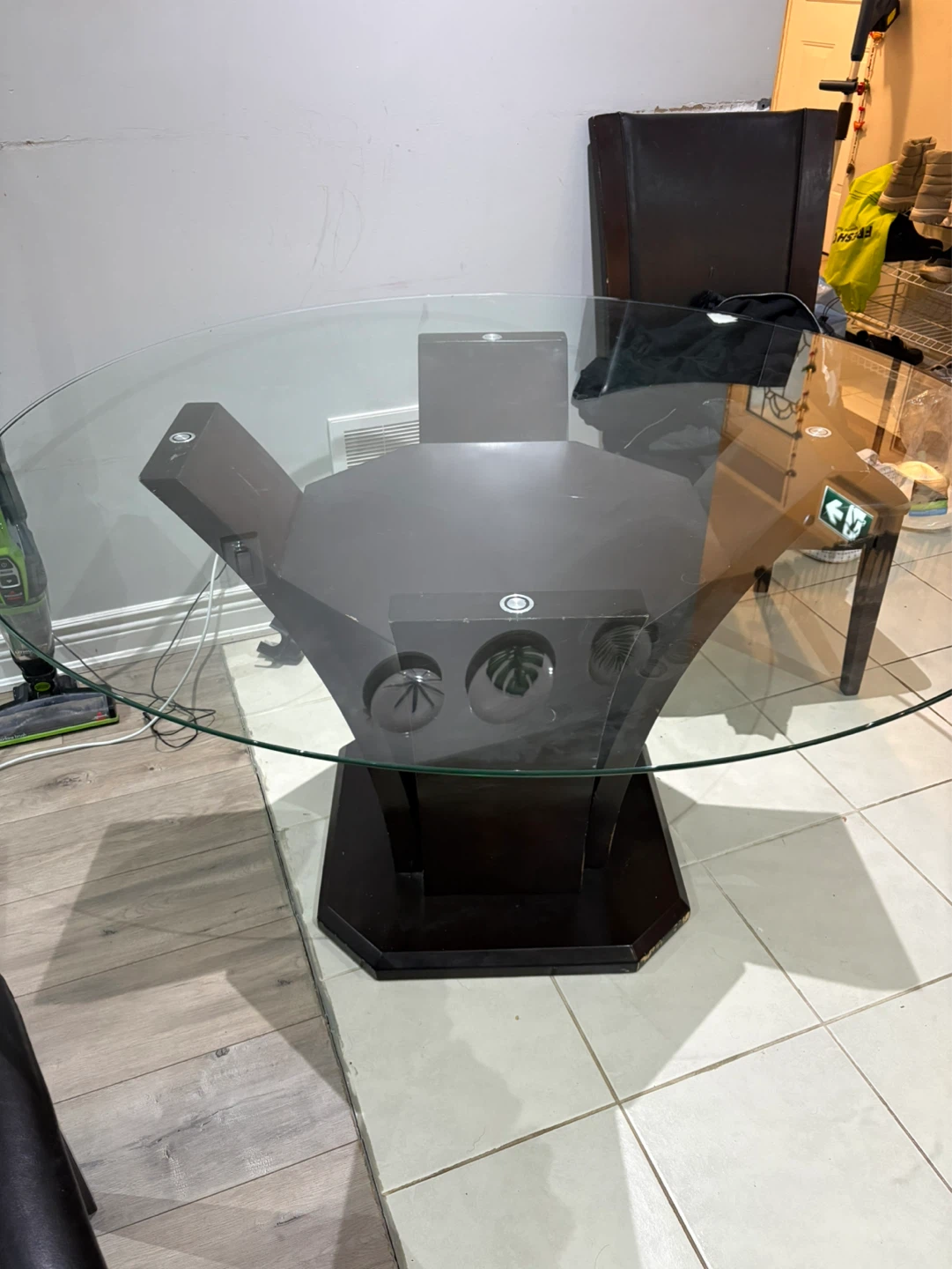 Glass top dining table with dark wood base - photo 3