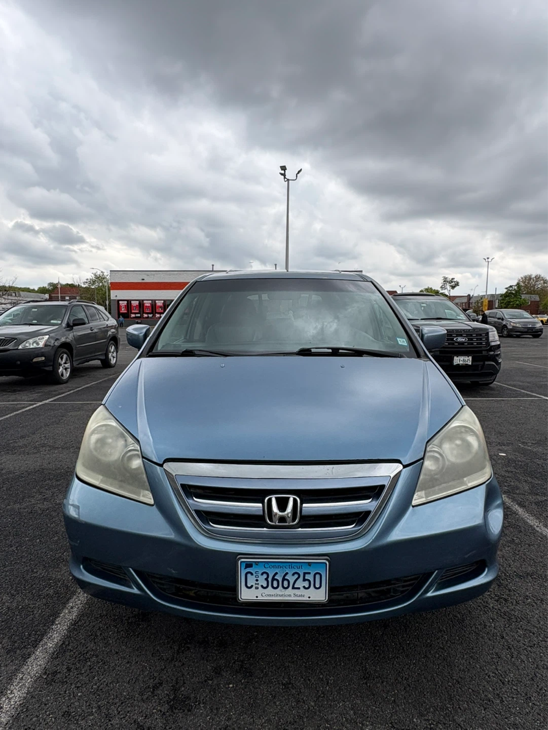 Blue Honda Odyssey Minivan