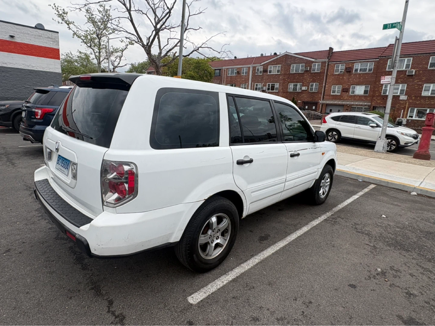 White Honda Pilot SUV - photo 2