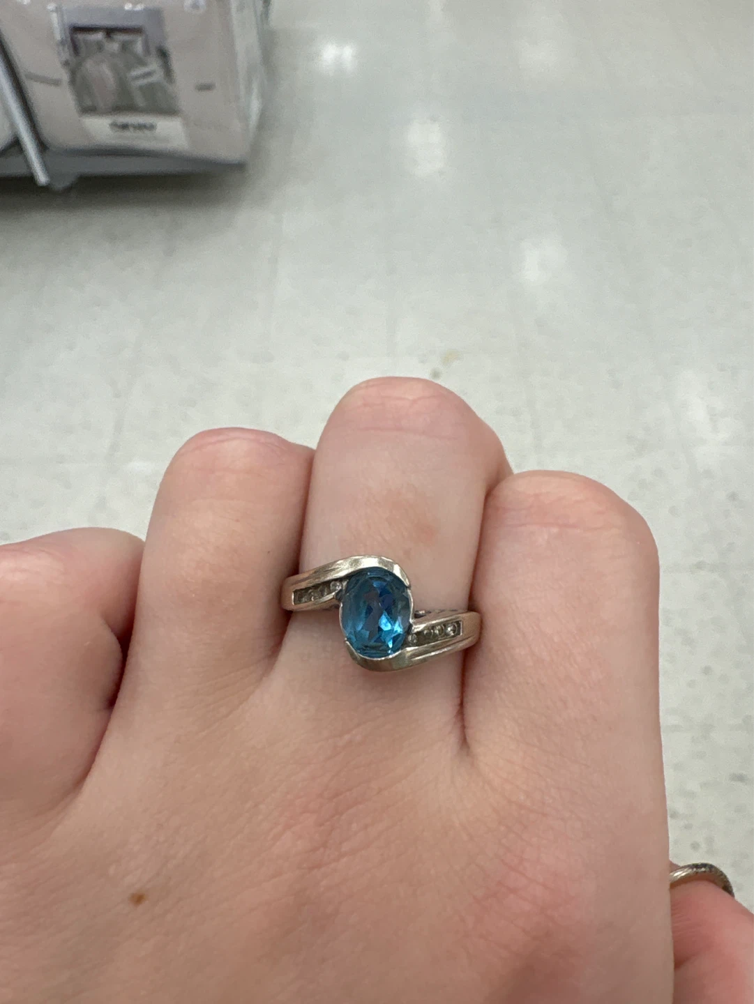 Sterling Silver Blue Topaz Ring with Accent Stones