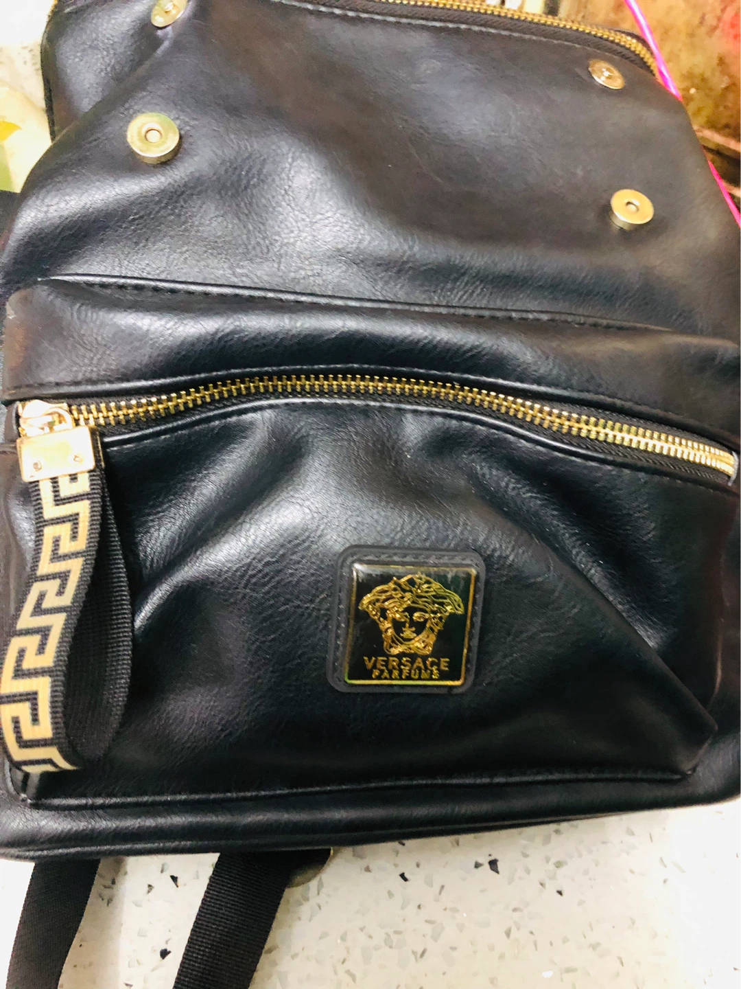 Versace Black Leather Backpack with Gold Greek Key Accent