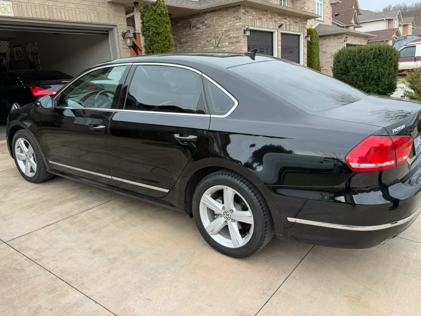 2012 Black VW Passat TDI Sedan