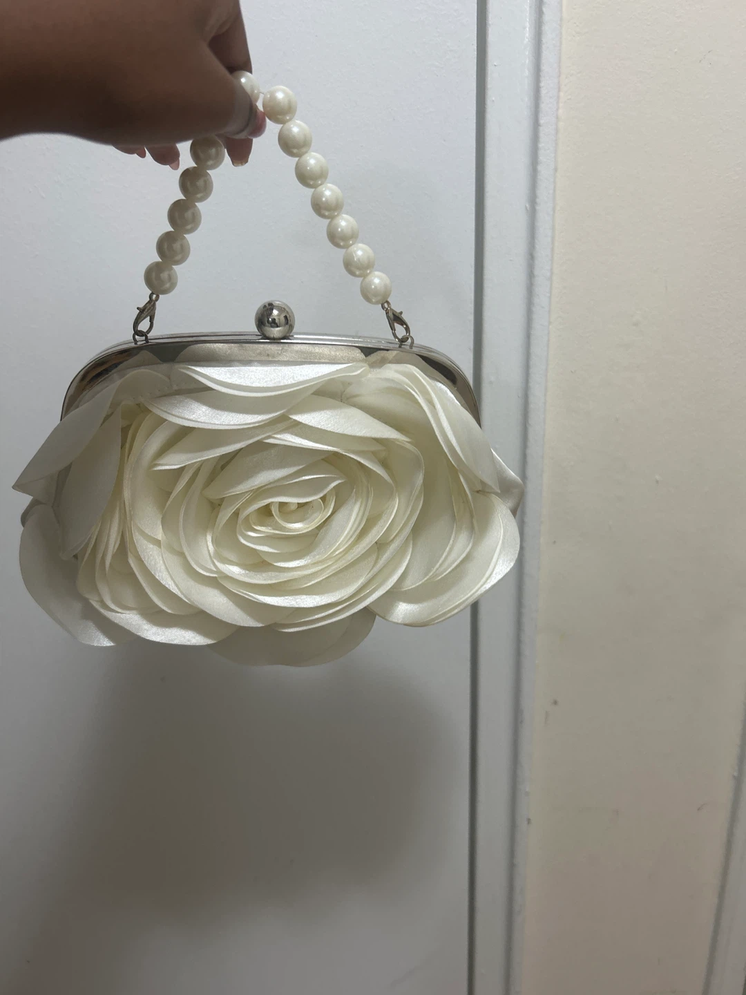 White Clutch Bag with Pearl Handle and Rose Detail