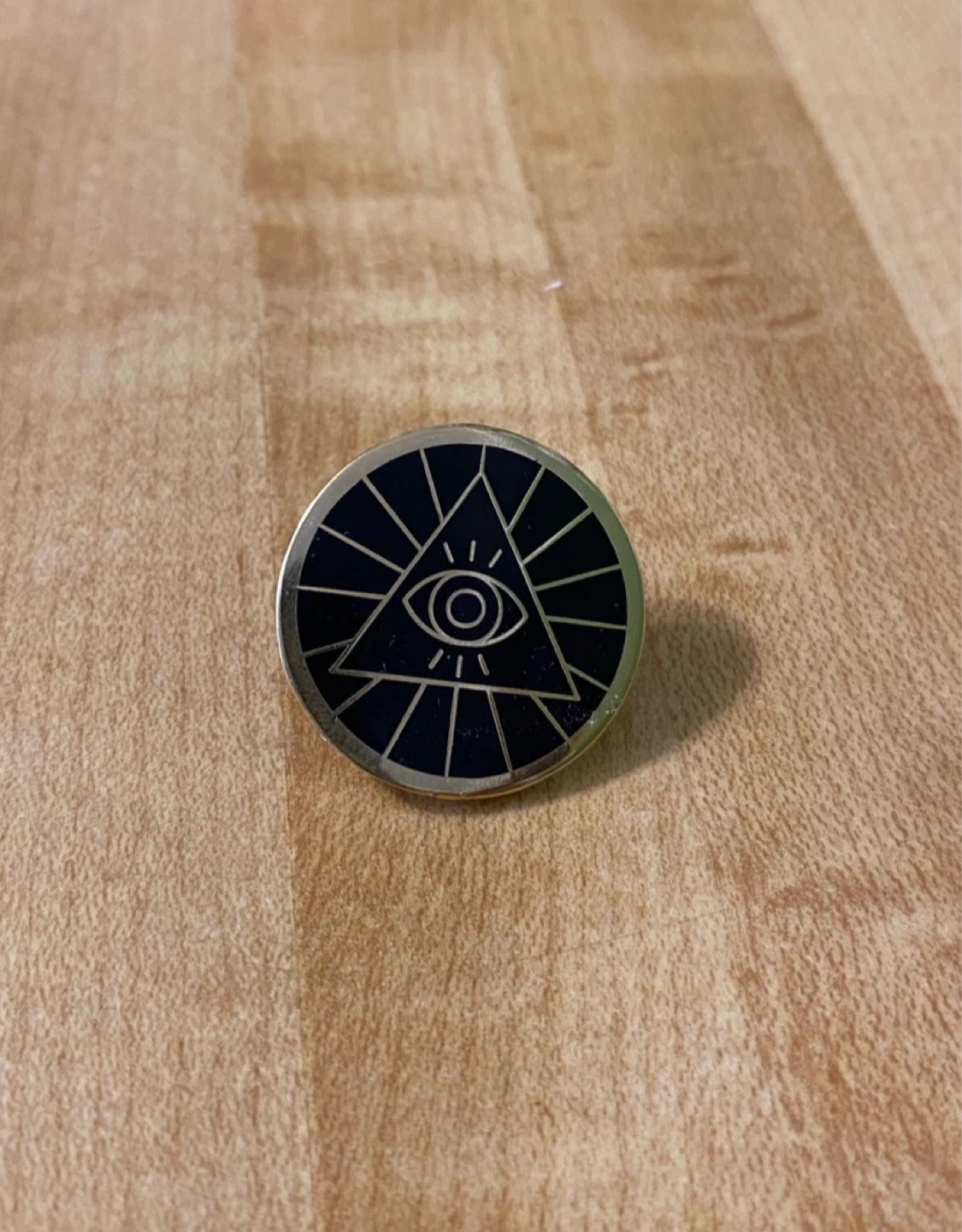 Illuminati enamel pin