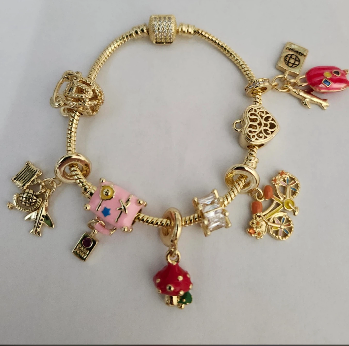 Gold Charm Bracelet with Travel & Nature Themes