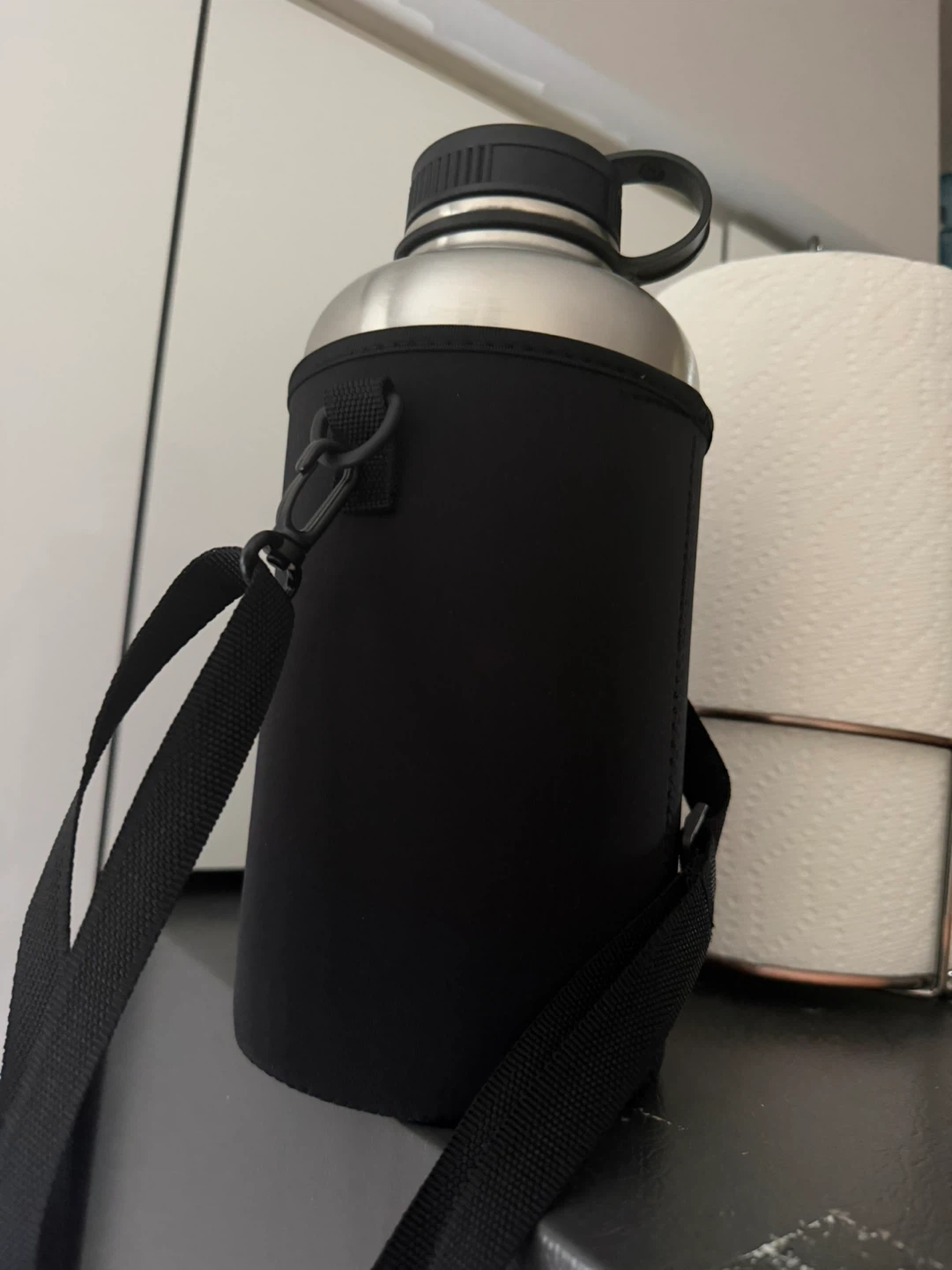 Stainless Steel Water Bottle with Black Sleeve and Strap
