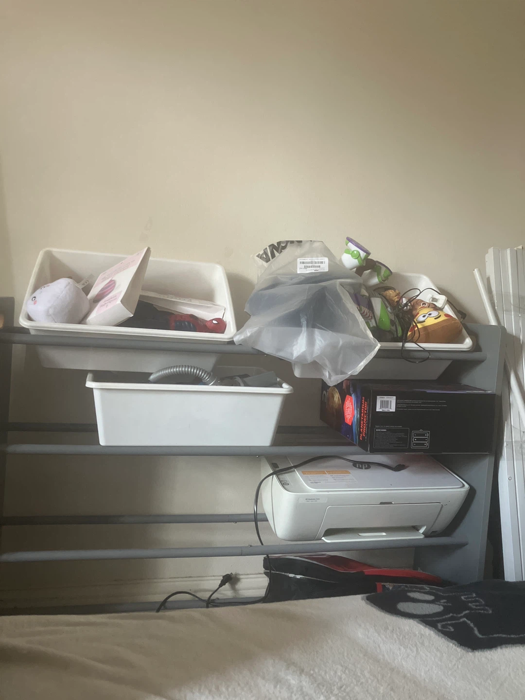 Children’s toy shelf with bins
