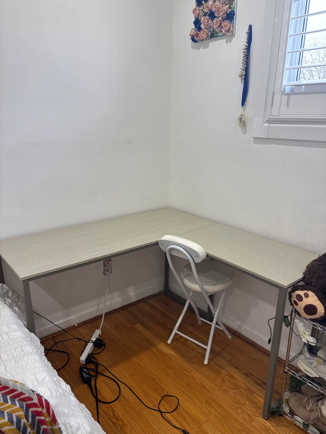L-shaped corner desk, light wood grain