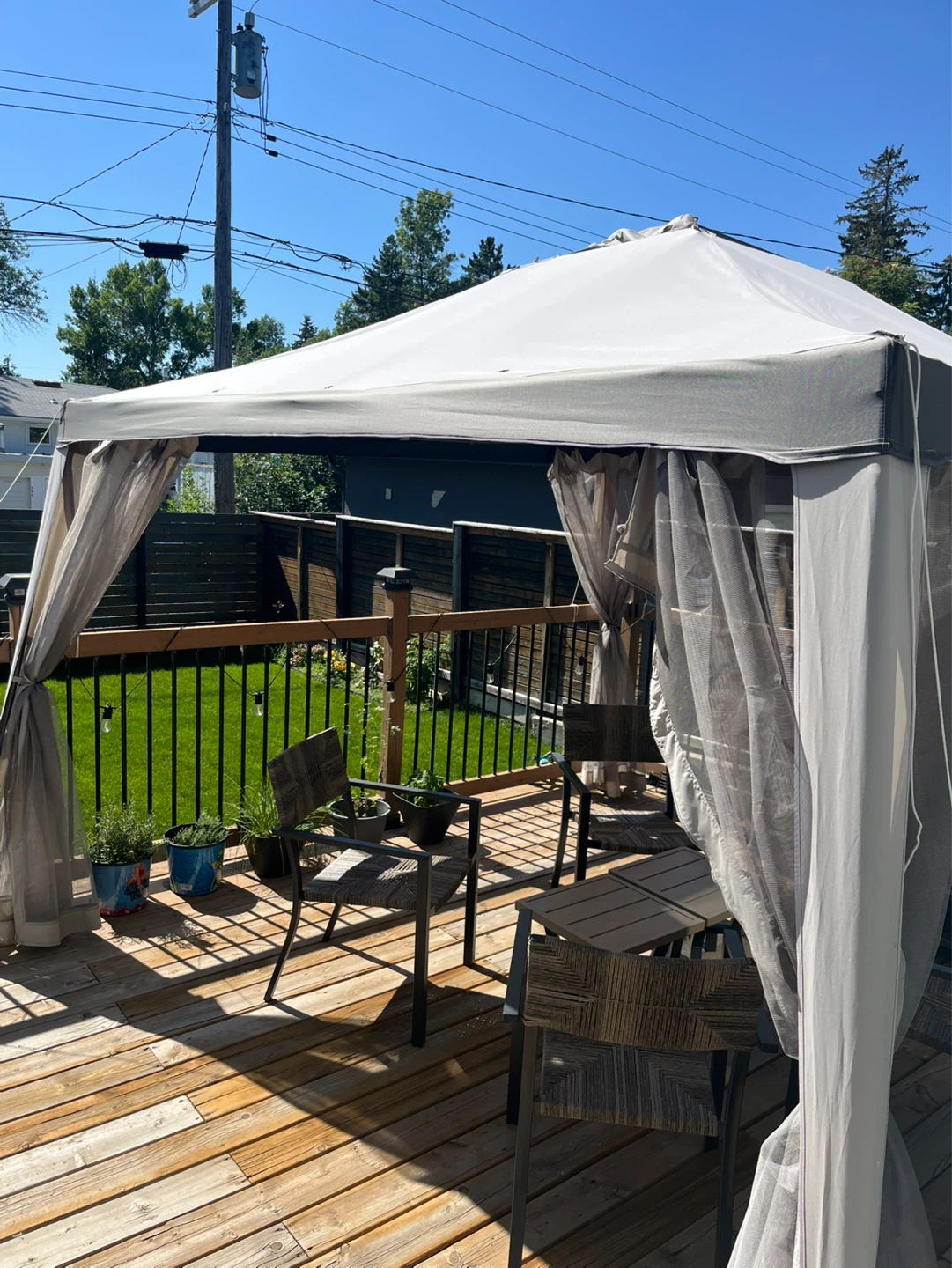 Gazebo with curtains and net screens