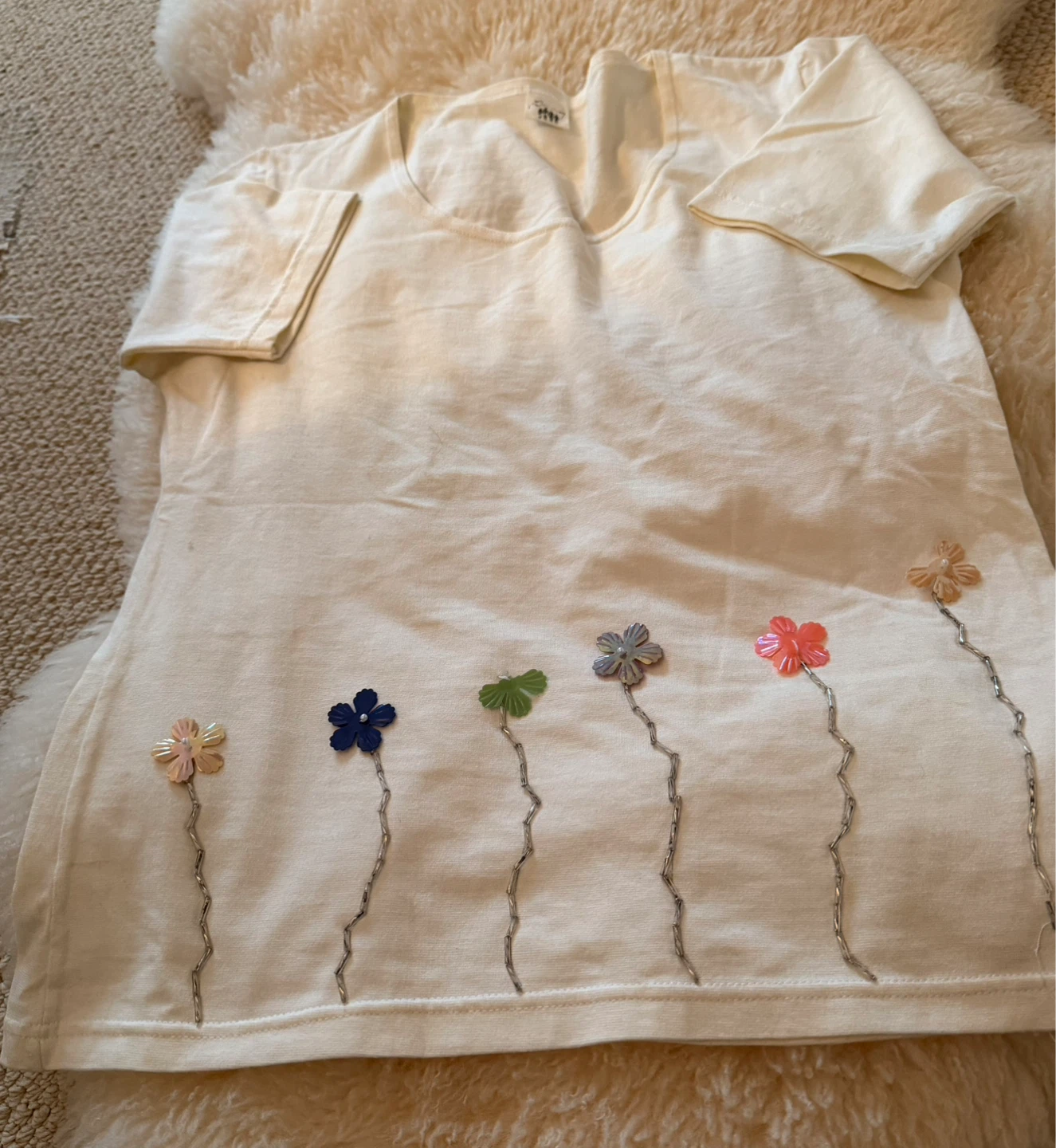 Cream T-shirt with beaded flower detail